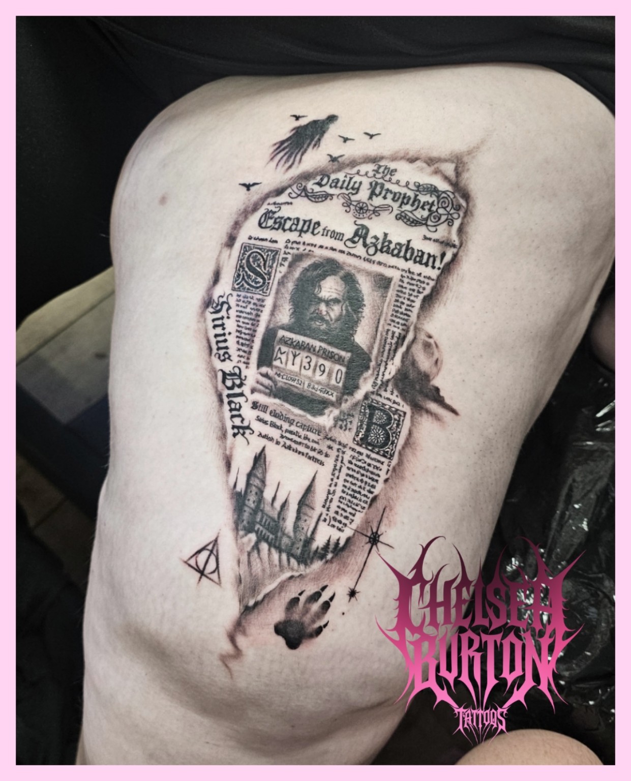 Black and grey newspaper tattoo