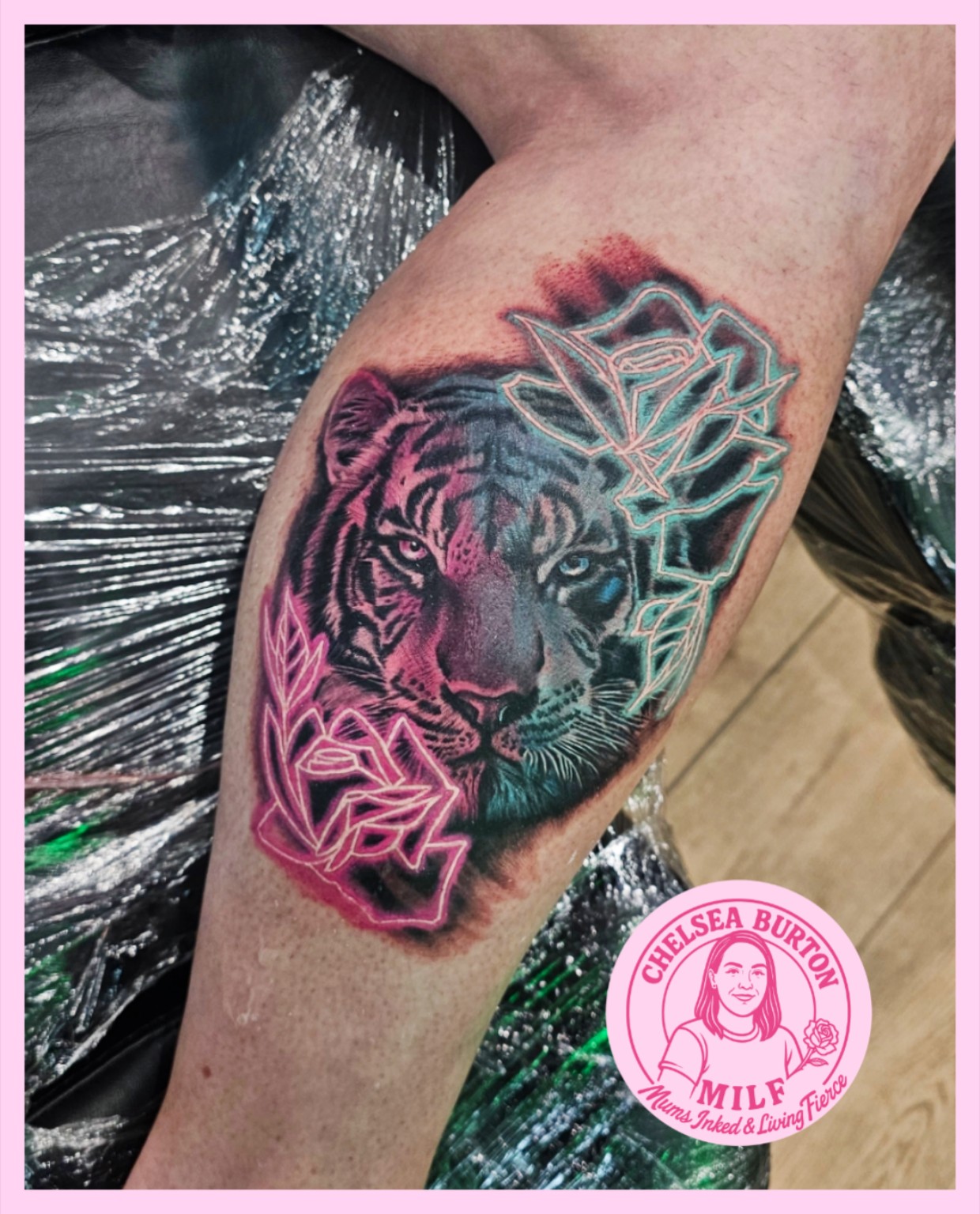 Colour tiger portrait tattoo with pink and turquoise floral linework